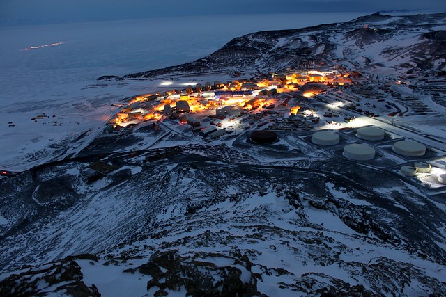 Photo of McMurdo Station at night in October 2010, complex project management on the AIMS project