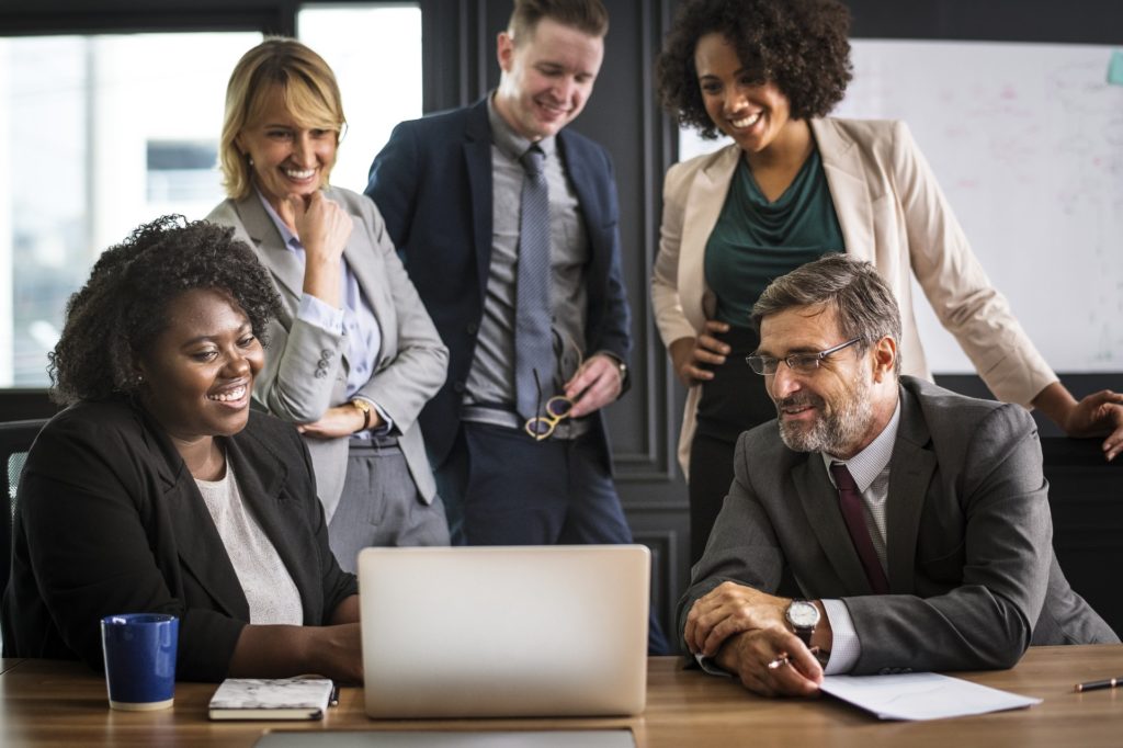 Group of people in a team meeting to improve professional communications